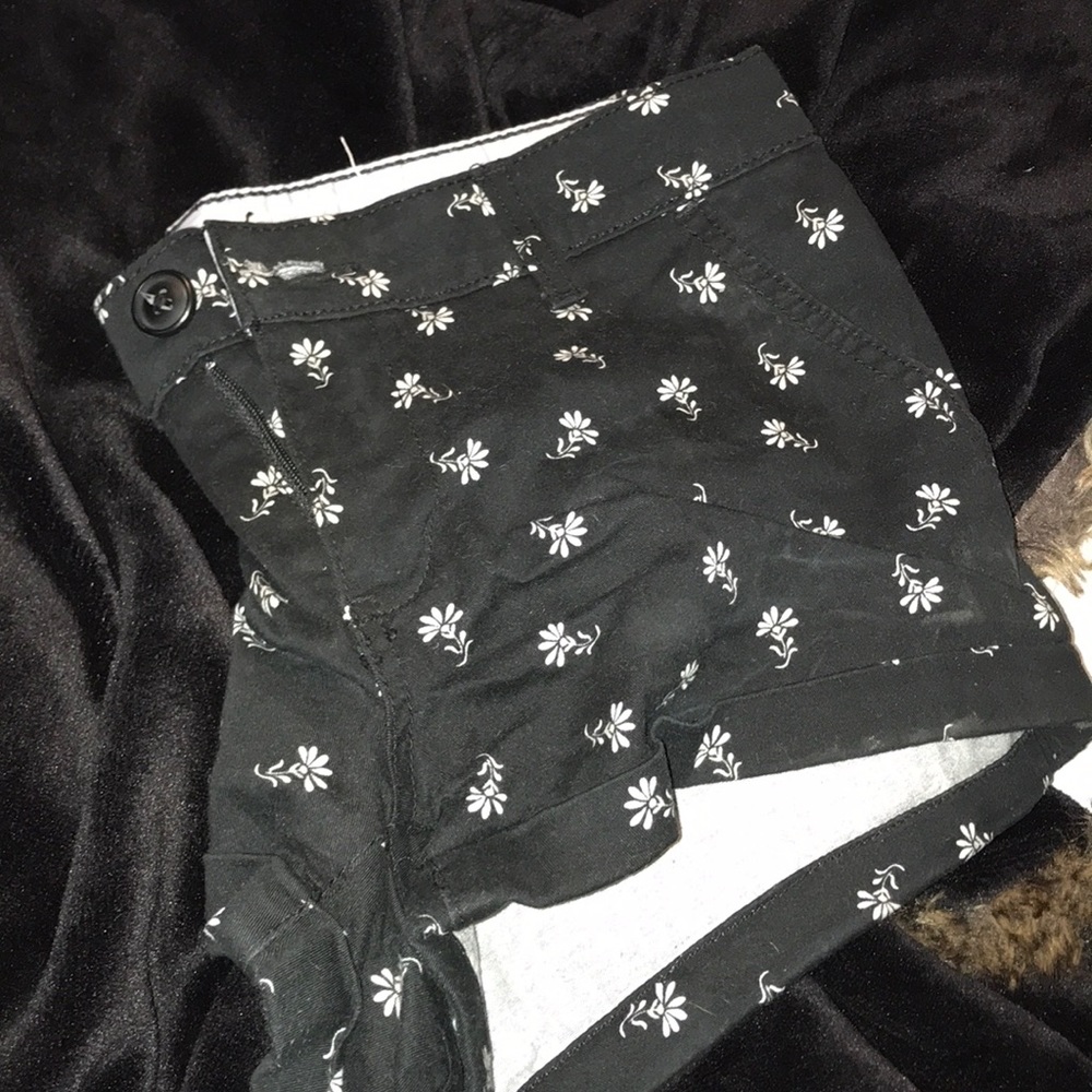 Black shorts with white flowers